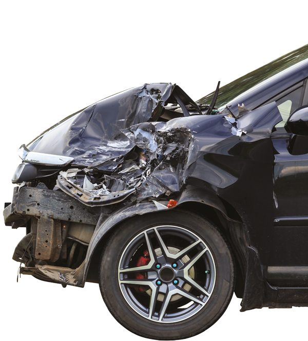 The front of a car, crushed, after a road collision