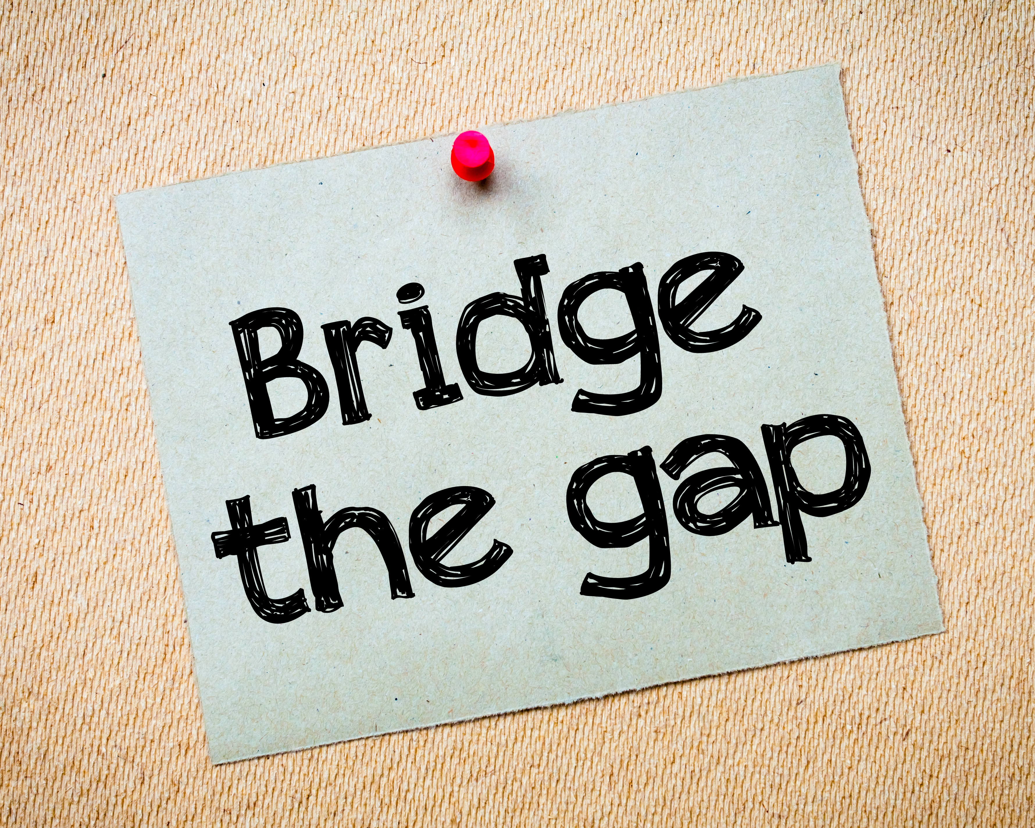 Bridge the gap pinboard sign